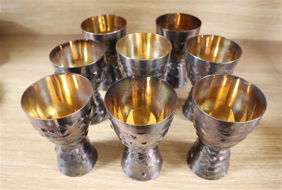 A set of eight plated goblets, marked R.E.F. with hammers, height 13cm